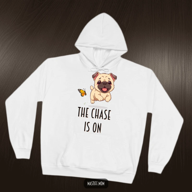 Funny Kawaii Mastiff puppy joyfully chasing a comically small butterfly, featured on a cozy hoodie, a warm funny gift.