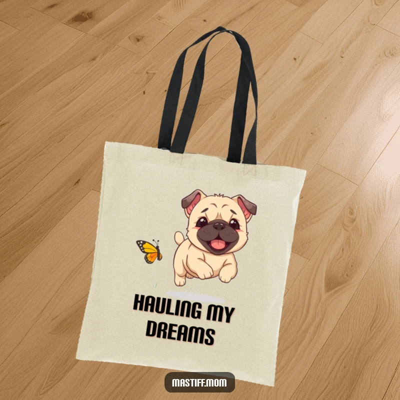 Funny Kawaii Mastiff puppy joyfully chasing a tiny butterfly, on a durable tote bag, a practical funny gift.